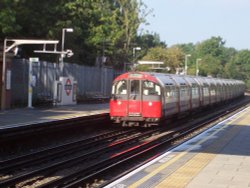 Sudbury Hill Station - Westbound train pulling out Wallpaper