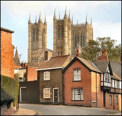 Lincoln Cathedral seen from Drury Lane in the old part of the city. Wallpaper