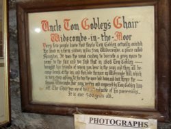 Uncle Tom Cobley's Chair wall plaque in Tom Cobley's Chair shop, Widecombe in the Moor, Devon. Wallpaper