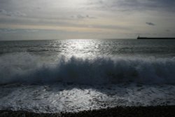 Newhaven lighthouse from the beach. East Sussex Wallpaper