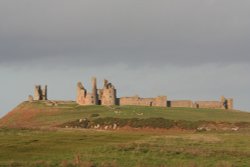 Dunstanburgh Castle, Craster, Northumberland. Wallpaper