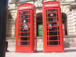 Red phone boothes in Chester Wallpaper