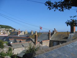 Mousehole in Cornwall - rooftops and sea Wallpaper