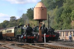 Severn Valley Railway train waiting to depart from Bewdley station with a train for Kidderminster Wallpaper