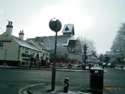 Prince of Wales Pub and Gatley Church, Greater Manchester, in the Snow - Mar 2006. Wallpaper