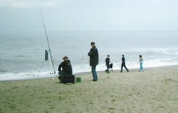 Fishing on Skegness beach. Wallpaper