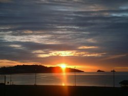 Sunrise over Torquay from Cambria Hotel, Paignton Seafront, Devon. Wallpaper