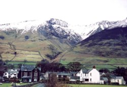 Threlkeld Village, Cumbria. The Knowe crags in the background.