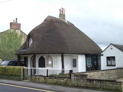 Thatched toll house, Trowbridge, Wiltshire. Built circa 1750 Wallpaper