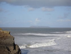 Lundy Island seen from the North Devon coast near Hartland Point Wallpaper