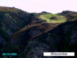 View from Ilfracombe Harbour, North Devon 
at the cliffs on the opposite side. Wallpaper