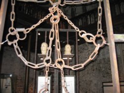 Death masks in a gibbet in the keep of Norwich Castle. Wallpaper