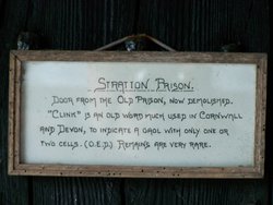 Sign on the prison door found in st Andrews church porch Stratton, Cornwall, England Wallpaper