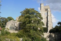 All Saint's parish church stands adjacent to the Archbishop's Palace in Maidstone, Kent Wallpaper