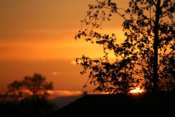 Sun going down over Barwell, Leicestershire. Taken with 400mm sigma apo pro lens,canon 350d Wallpaper