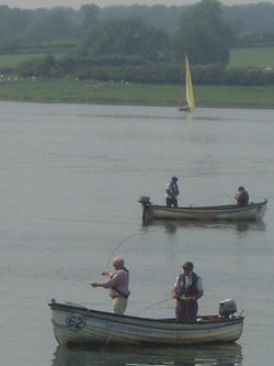 Fisherman taking time out on Rutland Waters