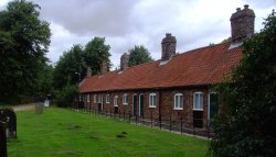 Bebe Houses in Tattershall Wallpaper