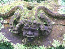 Mask at the Hever Castle Italian Garden Wallpaper