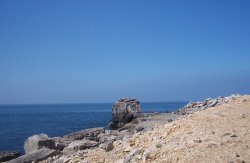 Quarried stone on the cliffs by Portland Bill Lighthouse, Dorset Wallpaper