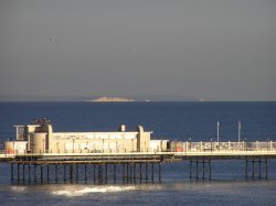 Worthing Pier with Distant Cliffs Wallpaper