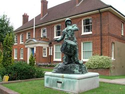 Statue in front of offices Wallpaper