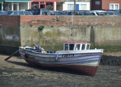 Boat in the harbour, Whitby, North Yorkshire Wallpaper