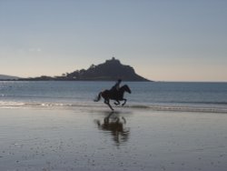 Early morning ride at Marazion Wallpaper