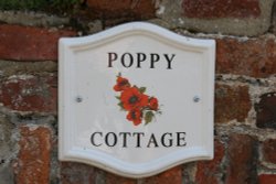 Cottage name plate Wallpaper