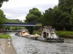 Workboat and barges entering Sprotbrough lock Wallpaper