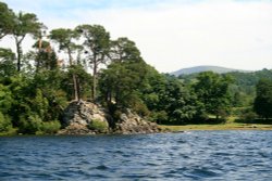 Friars Crag, Derwentwater,  a view looking from a pleasure craft. Wallpaper