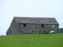 An old stone farmhouse on the top of the hill Wallpaper