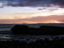 Sunrise on the lighthouse corner Wallpaper