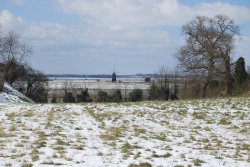 Windmill across the river from Roman Fort ruins Wallpaper