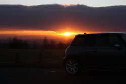 Car at sunset Wallpaper