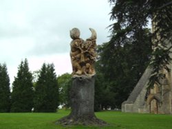 Two sided felled tree sculpture