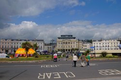 Teignmouth promenade looking across the green towards town centre - June 2009 Wallpaper