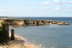 The beach and cliffs at Marsden Bay. Wallpaper