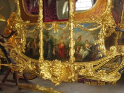 Royal Mews.  A close-up of the artwork that adorns one side of the gilded coach. I assume the other side is the same. Wallpaper