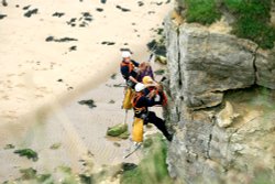 Cliff Top Rescue Wallpaper