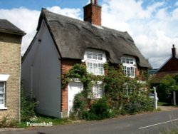 Pretty thatched cottage Wallpaper