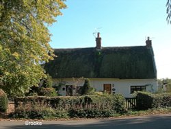 A thatched cottage Wallpaper