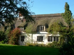 A thatched cottage Wallpaper