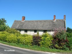 Thatched cottages opposite the Church Wallpaper