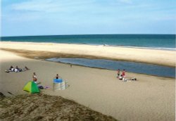 The beach at Winterton Wallpaper