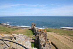 The coast of Northumberland from Dunstanburgh Castle Wallpaper