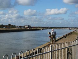 Fishing at the harbour Wallpaper