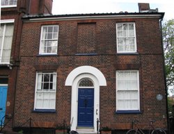 A house in Chapelfield North, opposite the gardens Wallpaper