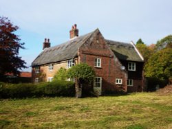 Thatched house near the former St. Peters Church. Wallpaper