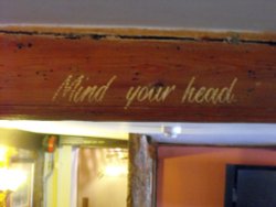 Mind your head...in the Coach and Horses Wallpaper