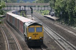 Freight train passing through Tilehurst Station Wallpaper